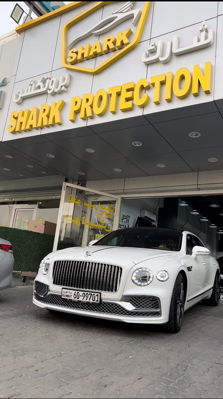 White Bentley Flying Spur at the Shark Protection KW studio