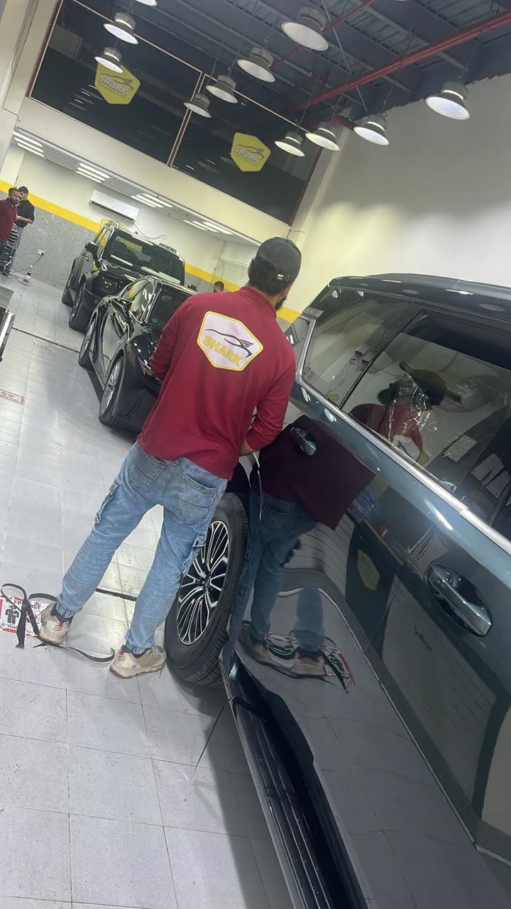 Technician applying protection in the studio
