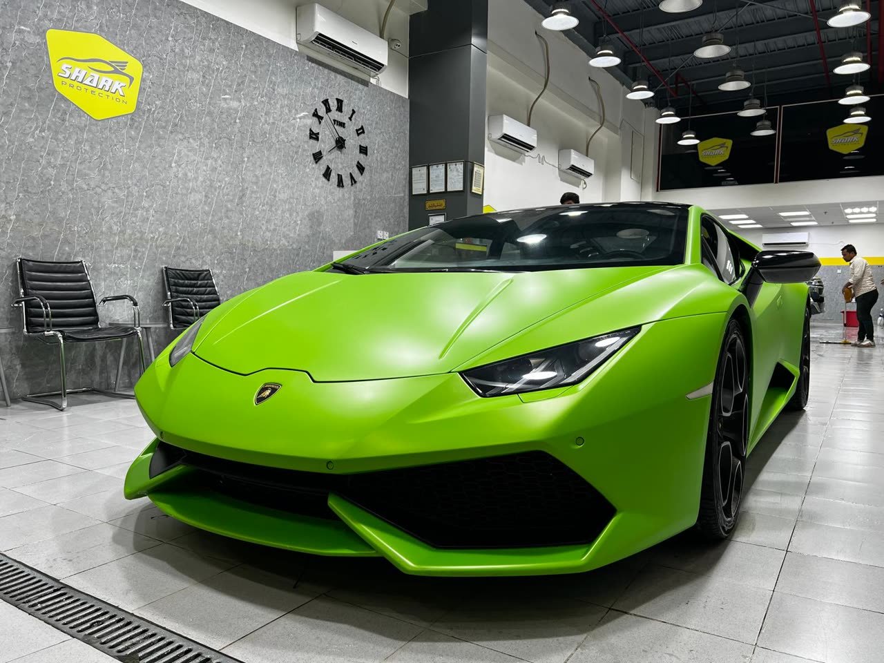 Matte green Lamborghini Huracán at the studio